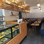 Kommabar Inde