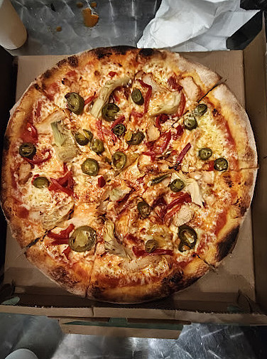 Tinos Pizzeria Mad