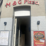 M G Pizza Udenfor