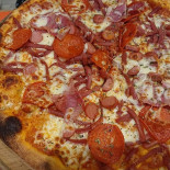 Delicato Stenovns Pizza Mad