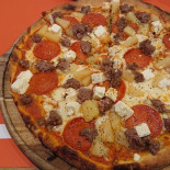 Delicato Stenovns Pizza Mad