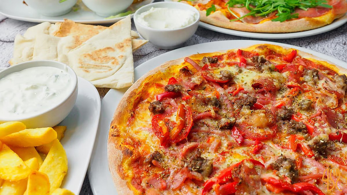Champions Pizza Mad