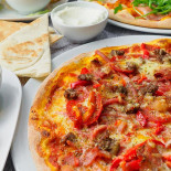 Champions Pizza Mad