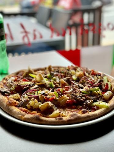 Roma Pizzaria Cafe Udenfor